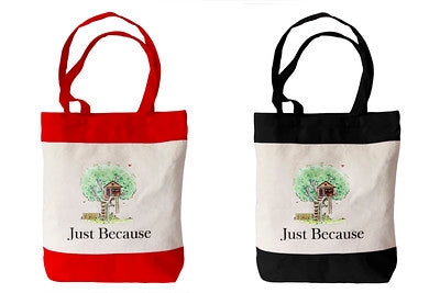 Two side by side Just Because book logo tote bags with red and black handles. 