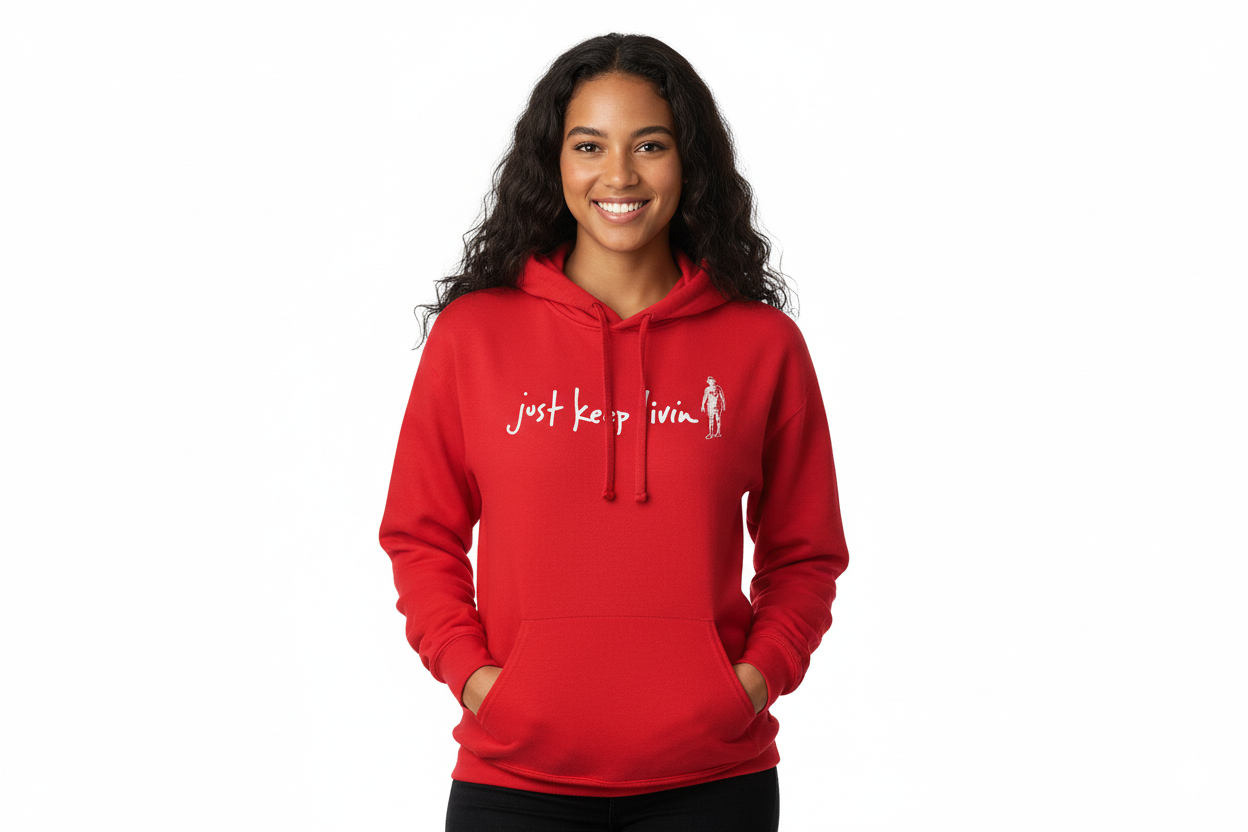 Young Woman modeling a red just keep living hoodie. 