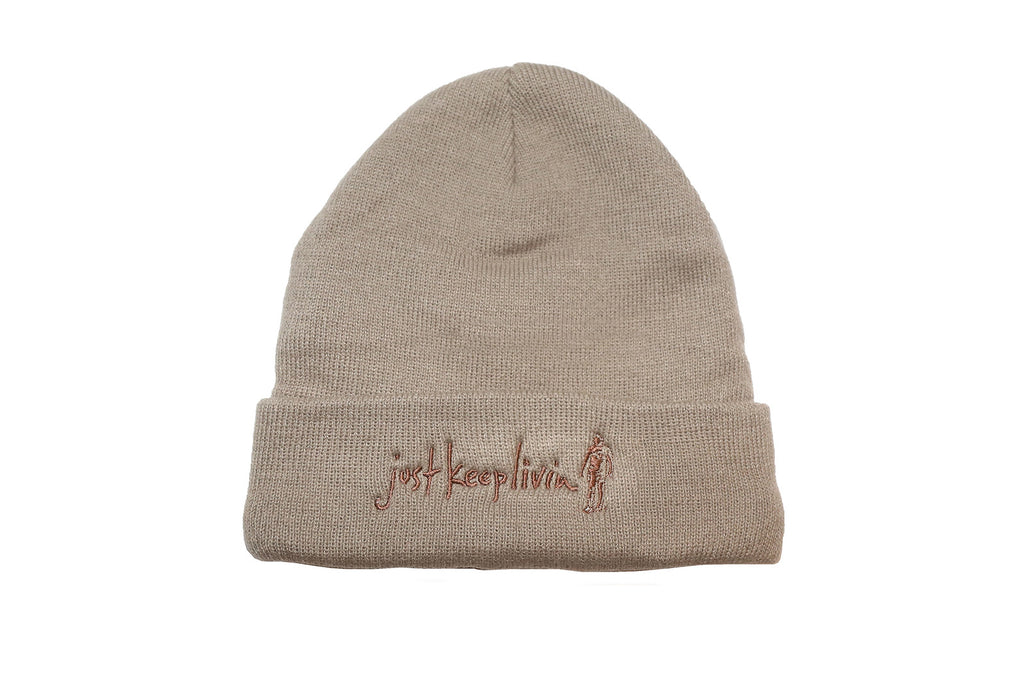Tan beanie with Just Keep Living embroidered logo in brown. 