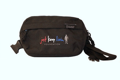  black belt bag with a logo that reads 'just keep livin'.