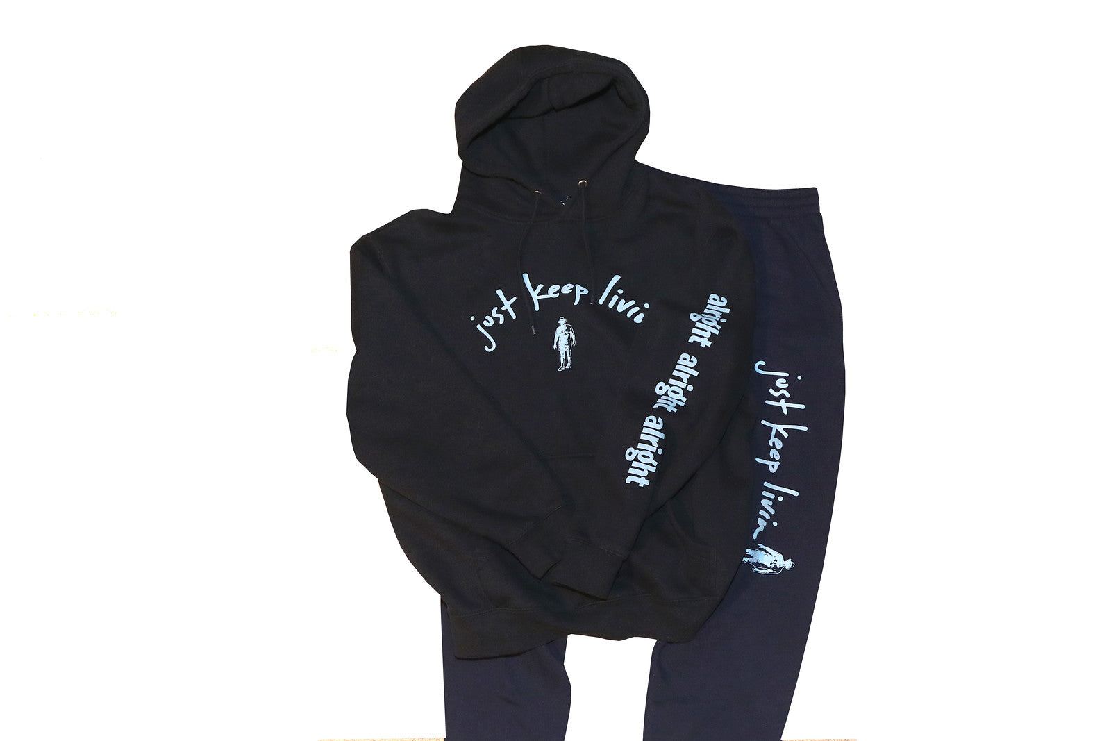 Jogging sweatshirt and pant set.  just keep livin logo in light blue text on sweatshirt with alright alright alright text on left sleeve. . just keep livin text logo on left pant leg above knee. 