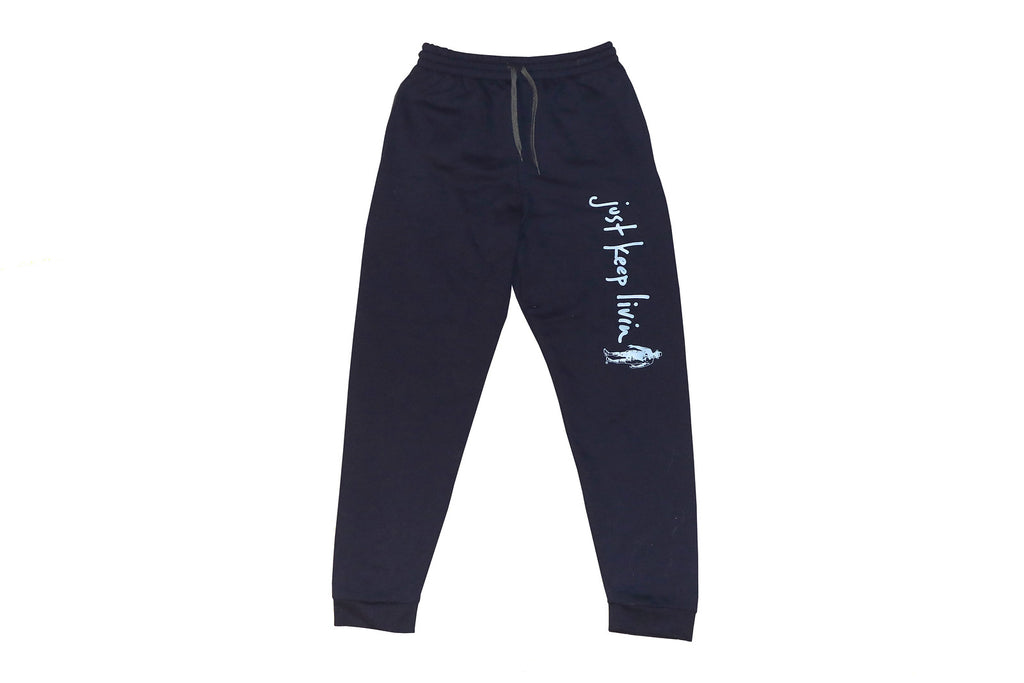 A pair of gray fleece jogger pants with a drawstring waistband and rib knit cuffs, featuring text on the left leg.