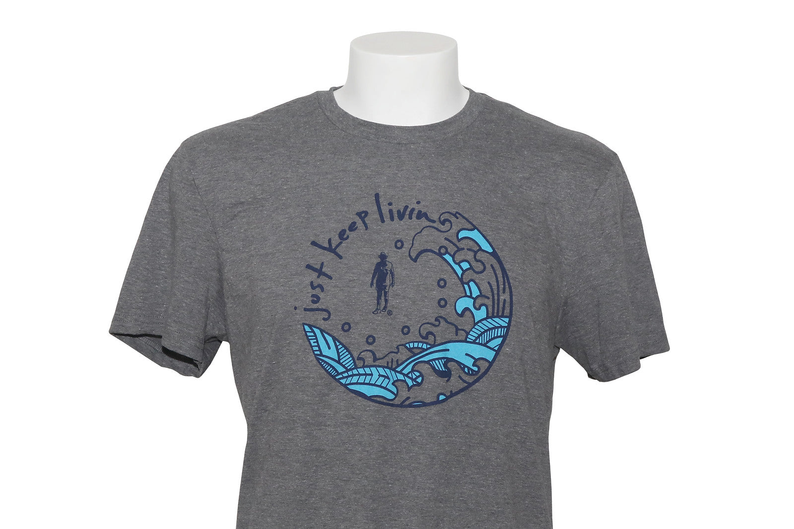 A dark heather gray t-shirt with a round blue screenprinted design on the front, featuring text and wave motifs.