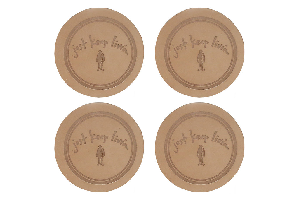 Four Pack of Just Keep Livin brown drink coasters.